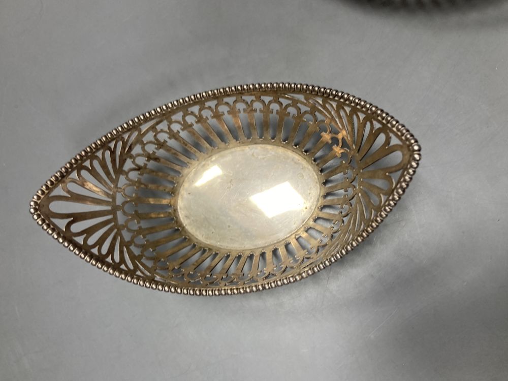 A pair of early 20th century Dutch pierced 833 standard white metal boat shaped bonbon dishes, 14.1cm, 7 oz.
